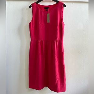 Jcrew pink midi dress in size 2. Never worn with tags.